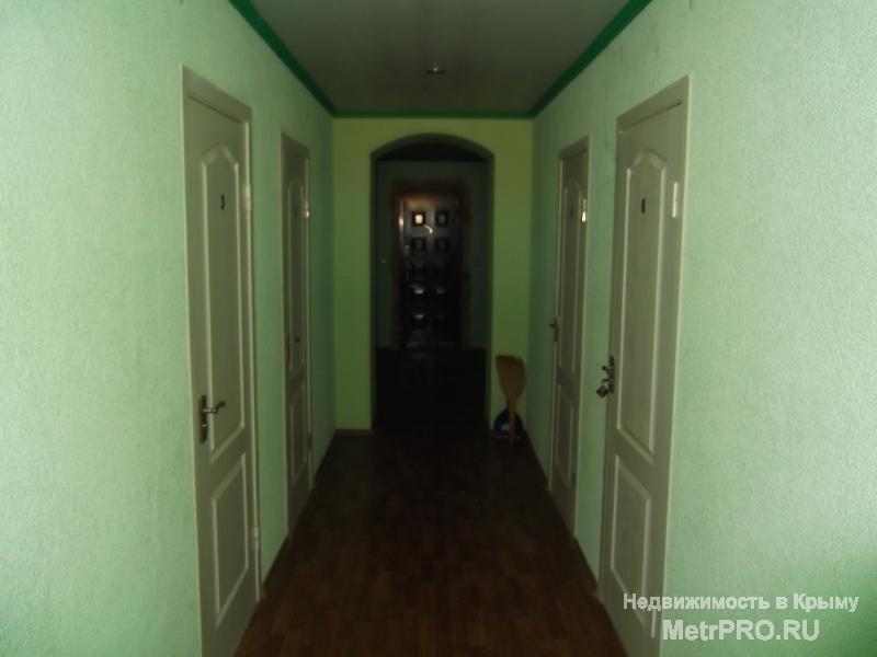 Продается мини-пансионат общей площадью 603 кв.м., с. Поповка, земельный участок 14 соток. Два этажа, 24 номера, из... - 14