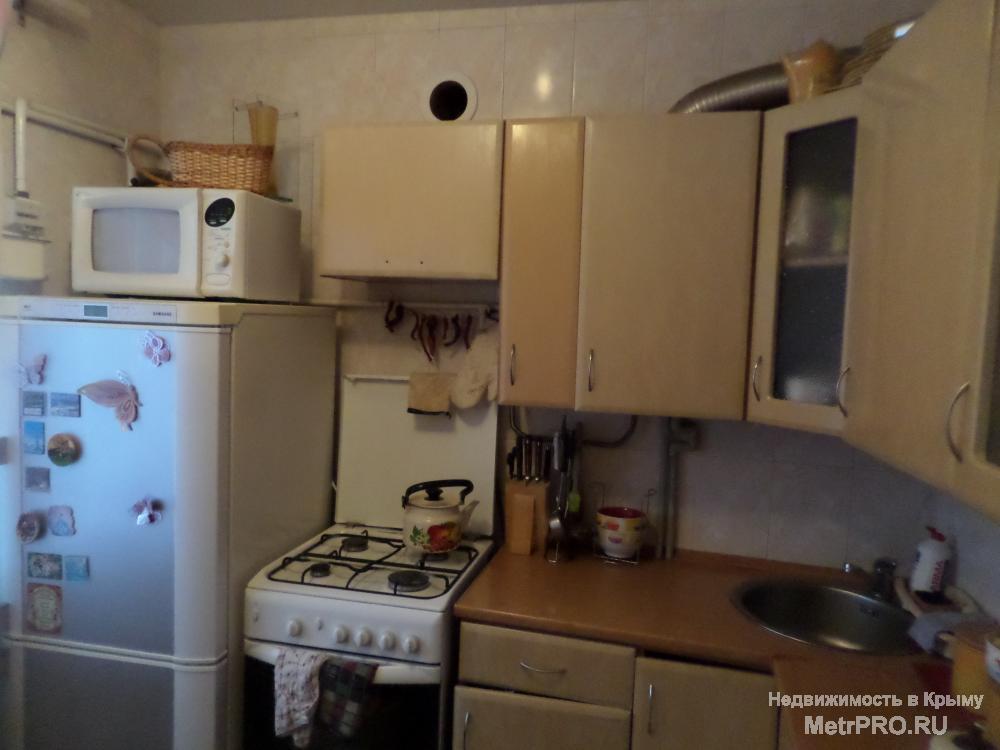 Продается 2к.кв по самой известной улице города Фрунзе. Квартира светлая, чистая, уютная с современным ремонтом на... - 3