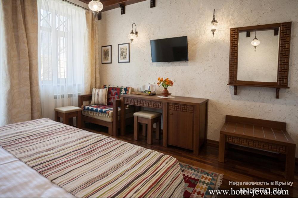 Отель Джеваль предлагает  свои просторные и уютные номера, со вкусом обставленные в восточном стиле, гостям Евпатории... - 4