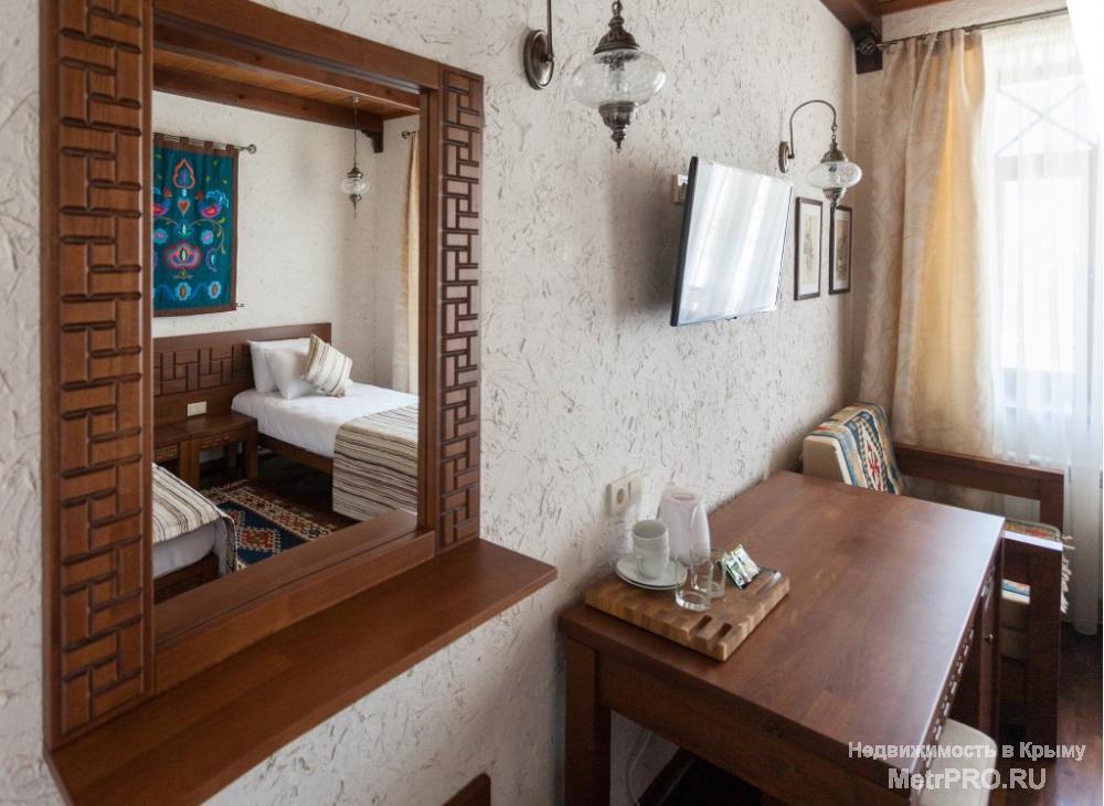 Отель Джеваль предлагает  свои просторные и уютные номера, со вкусом обставленные в восточном стиле, гостям Евпатории... - 6