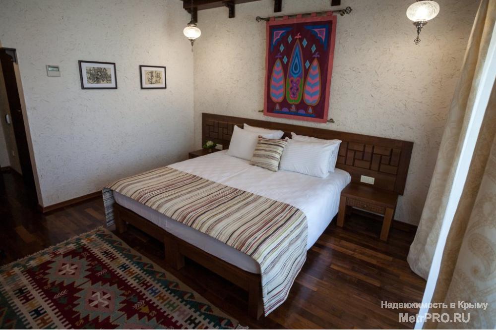 Отель Джеваль предлагает  свои просторные и уютные номера, со вкусом обставленные в восточном стиле, гостям Евпатории... - 7