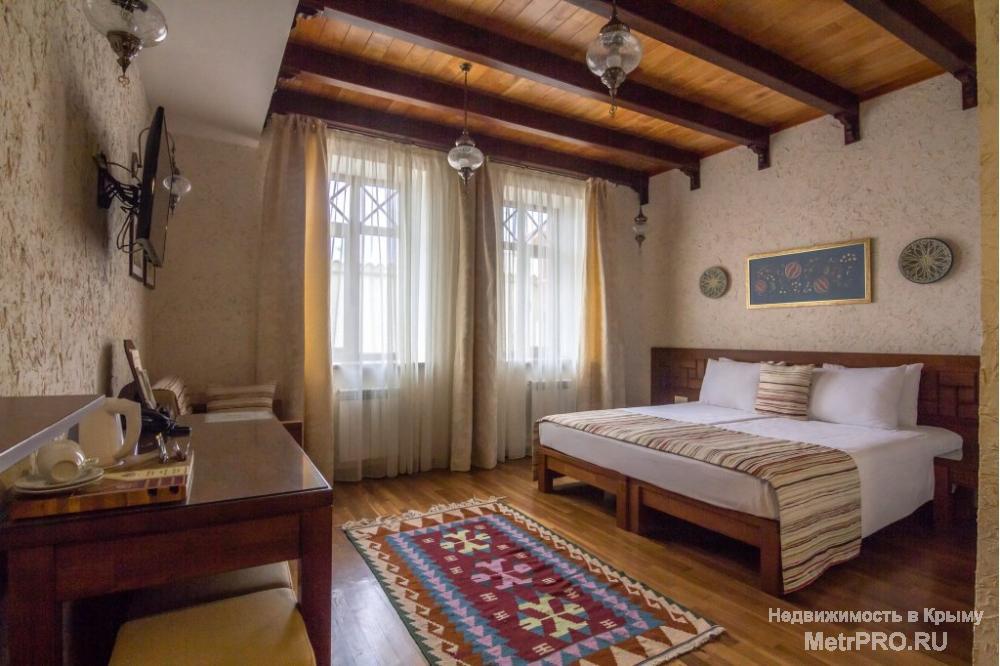 Отель Джеваль предлагает  свои просторные и уютные номера, со вкусом обставленные в восточном стиле, гостям Евпатории... - 11