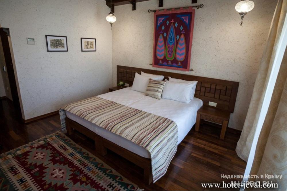 Отель Джеваль предлагает  свои просторные и уютные номера, со вкусом обставленные в восточном стиле, гостям Евпатории... - 12
