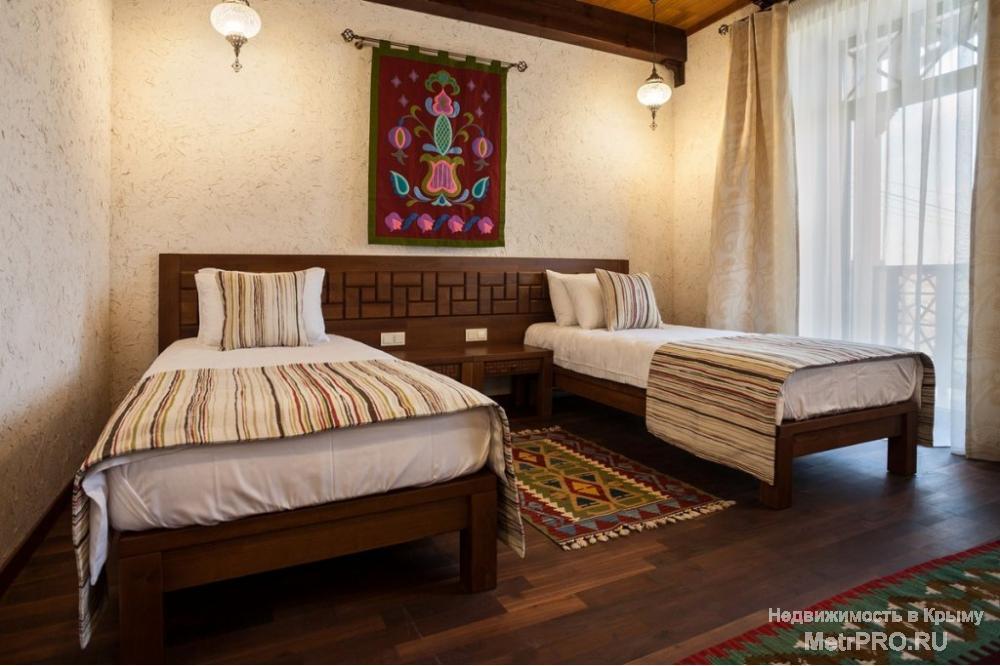 Отель Джеваль предлагает  свои просторные и уютные номера, со вкусом обставленные в восточном стиле, гостям Евпатории... - 13