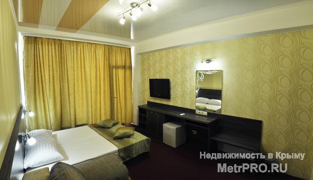 Уютный отель в тихой парковой зоне в центре Ялты в 1,5км от набережной. Новые современные комфортные номера,... - 6