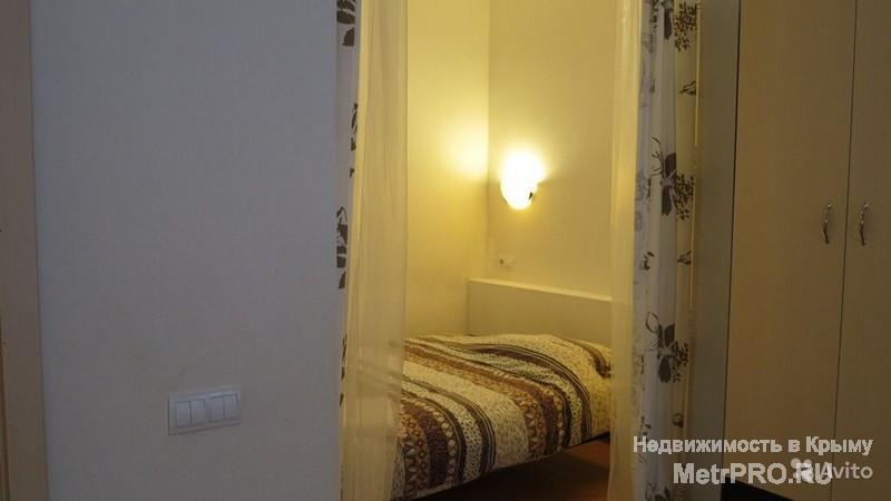 Продается пятиэтажный эллинг, мини - гостиница, общей площадью 250 м2, в Ялте, пгт. Отрадное, расположен в 120 метрах... - 7