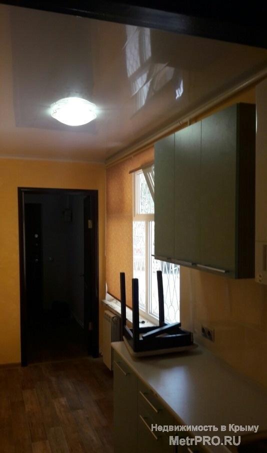 Продам помещение под офис (жилой фонд) в центре г.Симферополя по ул.Шмидта, первая линия, общая площадь 46м2. В офисе... - 4