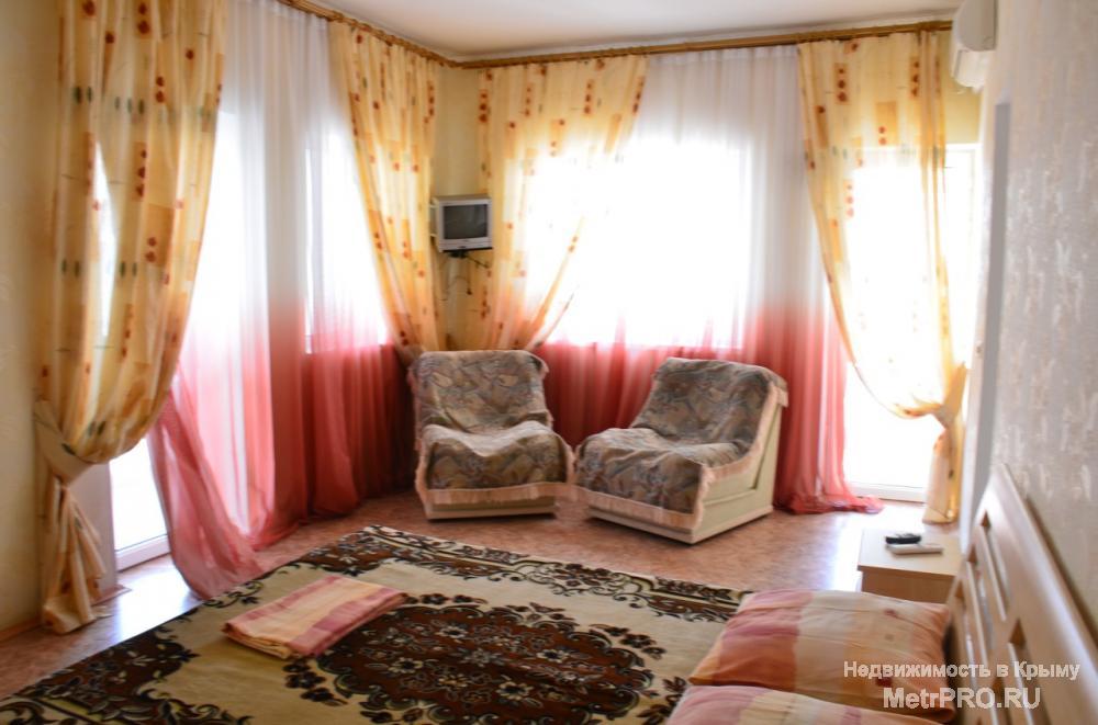 Продаётся гостиница в Ялте, пгт. Кацивели. Общая площадь строения 900 м2.  6 соток земли.20 благоустроенных номеров,... - 4