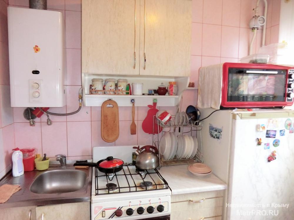 Продается 2 ккв в Ялте на Свердлова. 6 этаж 6-этажного дома, спецпроект. Общая площадь 48 м2, комнаты раздельные 18 и... - 6