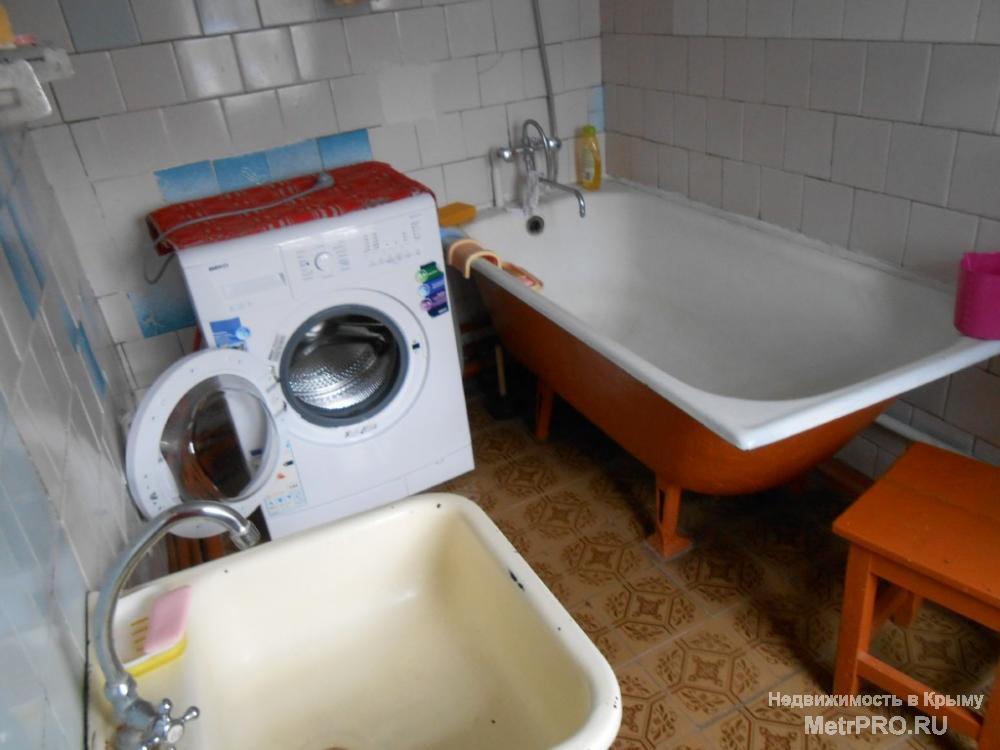Продам дом в Балаклаве, ул.Пригородненская, пять комнат, два входа. Общая площадь дома 85кв.м. Летняя кухня, гараж.... - 20