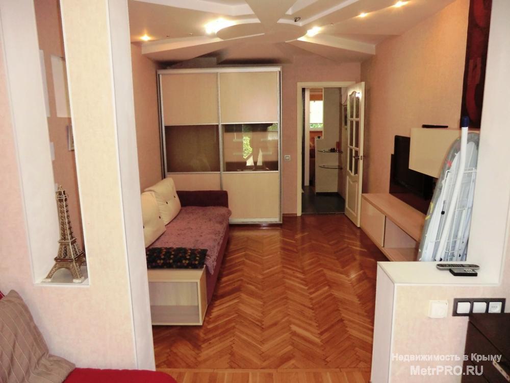 Продается 3 ккв в Ялте на Кривошты. 1 этаж. Общая площадь 74 м2. Евроремонт. Мебель, техника. Санузел совмещенный,... - 7