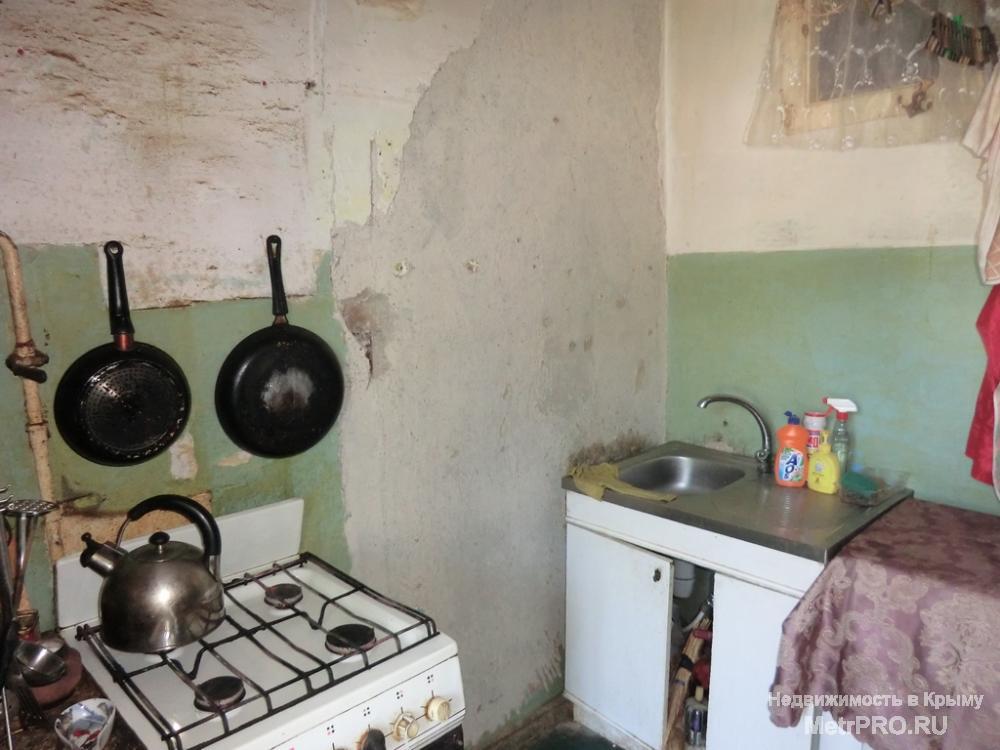 Продается 2 ккв в Ялте на ул.Украинская. 4 этаж. Общая площадь 57 м2. Жилое состояние. Центральное отопление, газовая... - 8