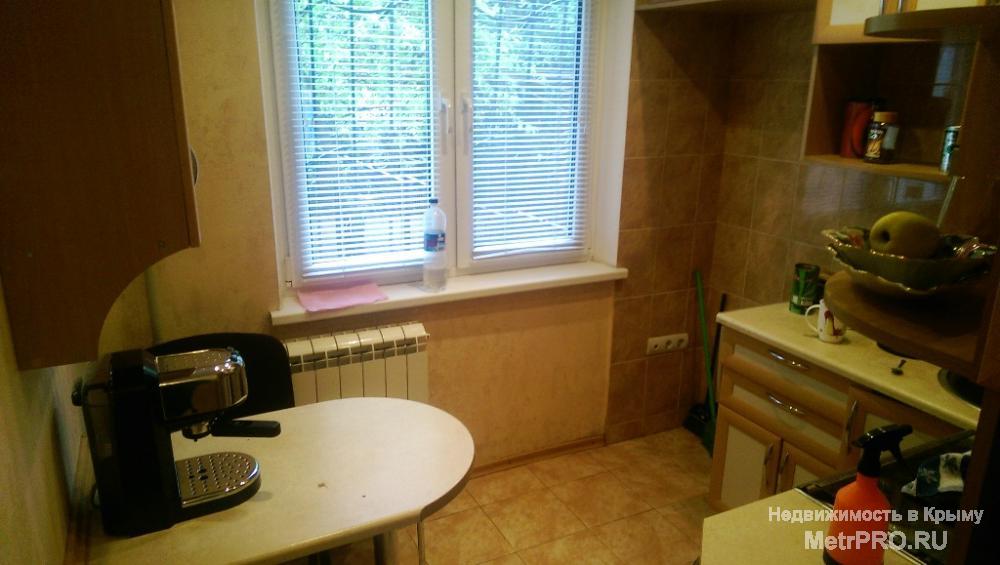 Продается 2 ккв в Ялте на ул. Киевская. 1 этаж. Общая площадь 46 м2. С ремонтом. Мебель, техника. Отдельный вход,... - 6