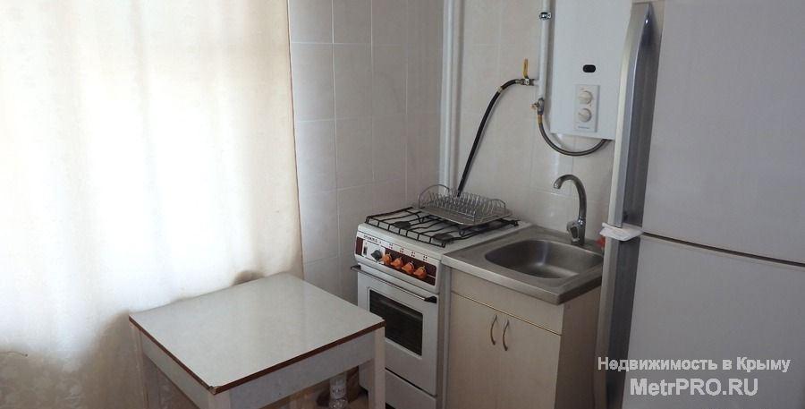 Продам 3 ккв в Ялте на ул.Цветочной. 4 этаж. Общая площадь 57 м2. Косметический ремонт. Мебель, техника.... - 8