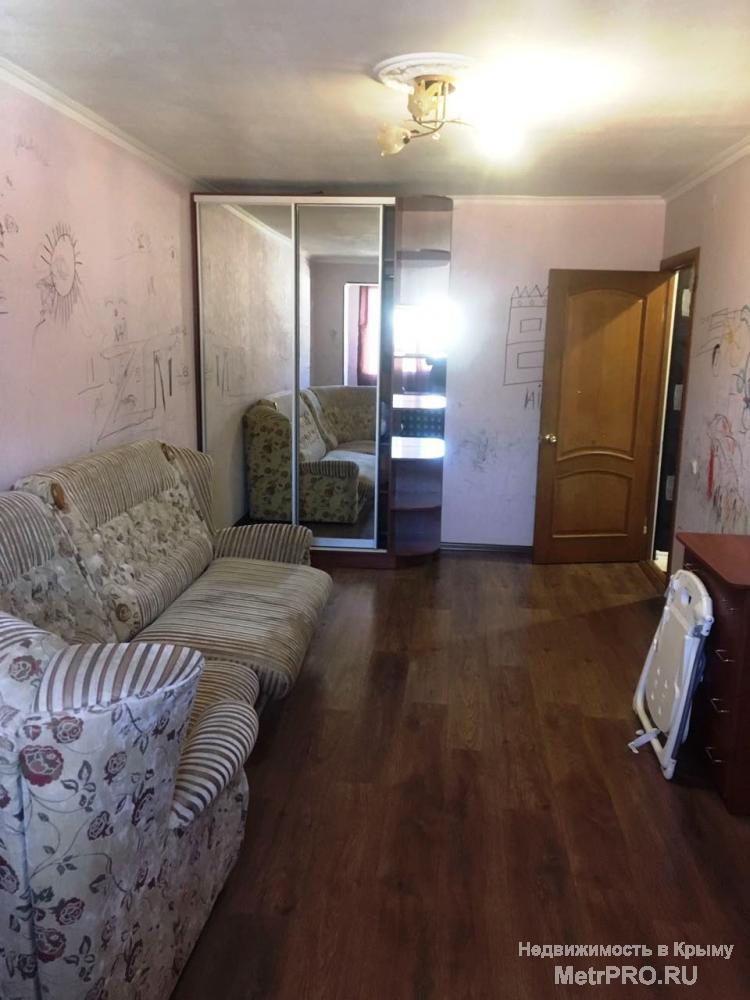 Продажа 2 к. кв. в Ялте по ул.Суворовская. Общая площадь 58 м2, комнаты раздельные 17,8 м2 и 14,3 м2,  кухня 11м2,... - 2