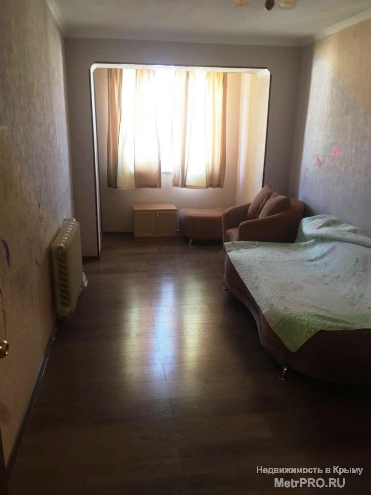Продажа 2 к. кв. в Ялте по ул.Суворовская. Общая площадь 58 м2, комнаты раздельные 17,8 м2 и 14,3 м2,  кухня 11м2,... - 4