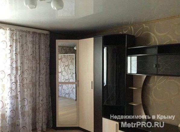 Продам квартиру в новом 8 микрорайоне с качественным ремонтом, полы - ламинат в комнате, плитка на кухне и коридоре.... - 3