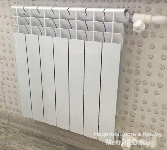 Продам квартиру в новом 8 микрорайоне с качественным ремонтом, полы - ламинат в комнате, плитка на кухне и коридоре.... - 7