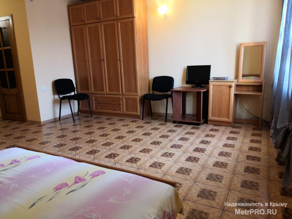 Продам гостиницу на 18 номеров в пригороде Евпатории Заозерном. Общая площадь 350м2.  Участок 15 соток. Расстояние к... - 14