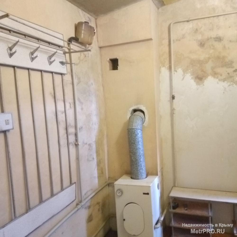 Дом в Гвардейском из ракушки, с газовым отоплением. В доме 3 комнаты, кухня, сан узел. Участок 10 соток. На участке... - 2