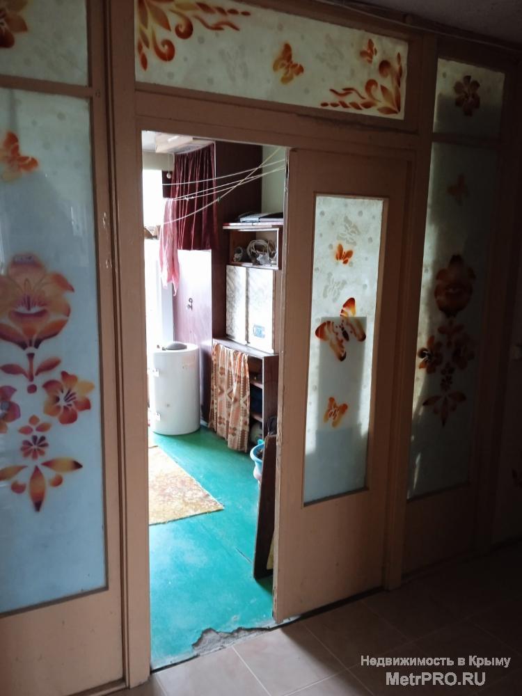 Продаётся комната в коммунальной квартире. Адрес: Евпатория, ул. Сытникова, 8, 5 этаж 5-ти этажного дома. Хорошие... - 15